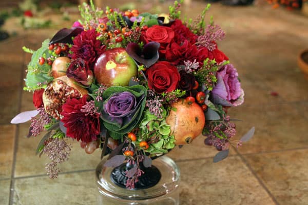 Gather & Give market basket with blooms and treats