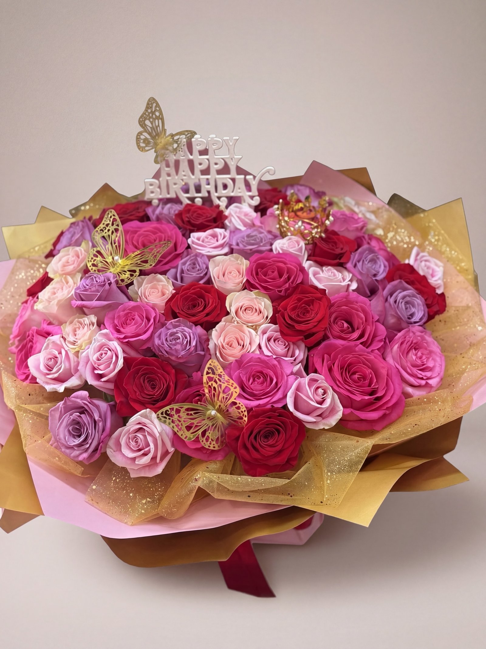 Birthday Queen bouquet in its pink box with red ribbon