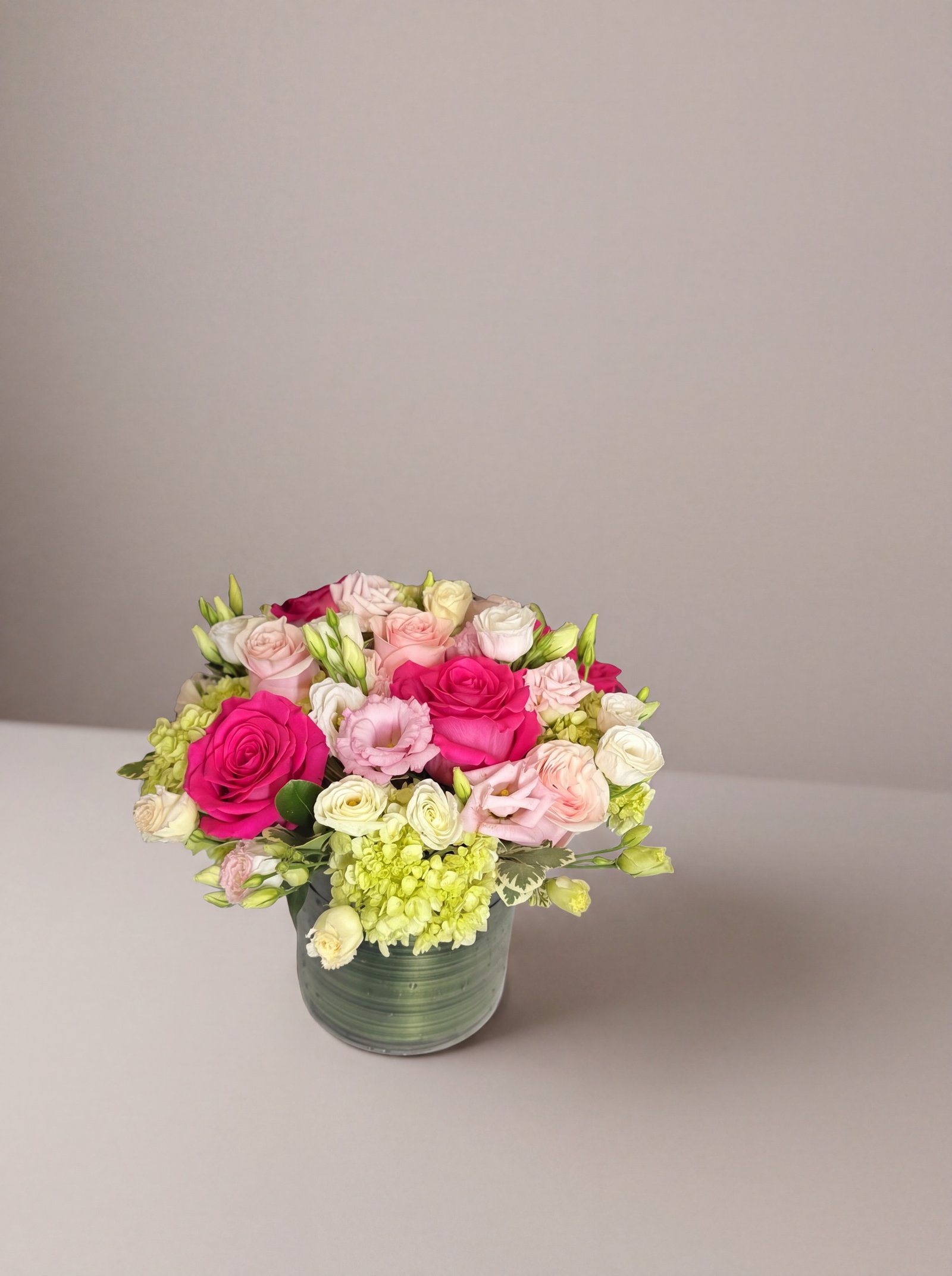 Pink Persuasion arrangement seen at a distance on a studio surface