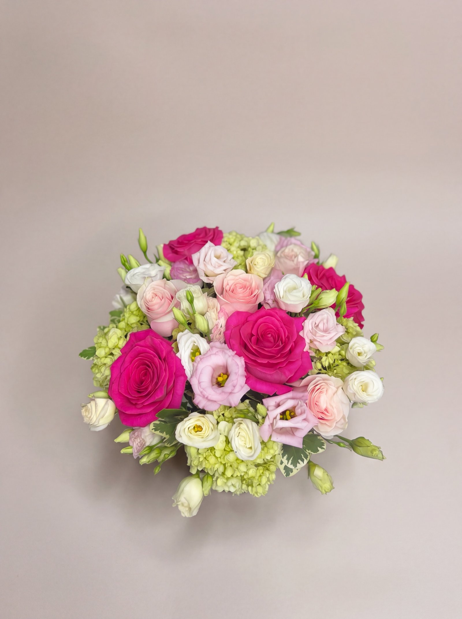 Overhead view of the Pink Persuasion dome of pink roses and green hydrangea