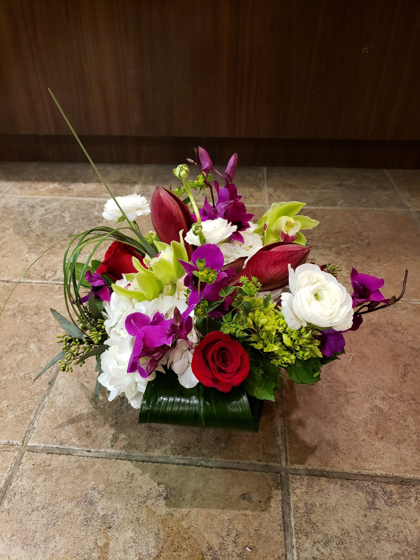Velvet Garden arrangement with burgundy dahlias and dark roses